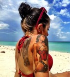 beach girl tattoo woman hand tattoo