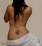 elegant bird tattoo bird symbol for sankofa on back