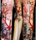 geometric abstract tattoo red and black sleeve