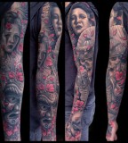 tattoo by Mike DeVries faces red blossoms sleeve