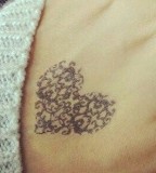 lace tattoo little heart on hand