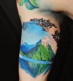 realistic mountain tattoo on arm