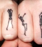 dancing skeletons tattoo sance moves finger tattoo