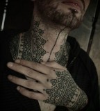 hand and neck ornamental tattoos by guy le tattooer