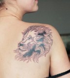 lion shoulder tattoo by diana katsko