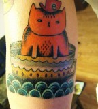 Awesome cat and cup tattoo