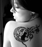 Black cat and rose tattoo