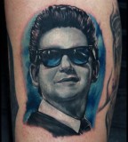 Blue man tattoo by Rich Pineda