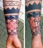 Colorful flowers tattoo by Philippe Fernandez