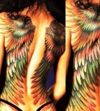 Colorful wings tattoo