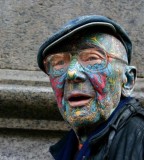 Old man colorful face tattoo