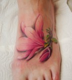 Red flowers foot tattoo