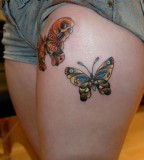 beautiful tattoo placement butterflies on upper thigh