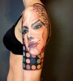 marie kraus tattoo upper arm sleeve with woman's face