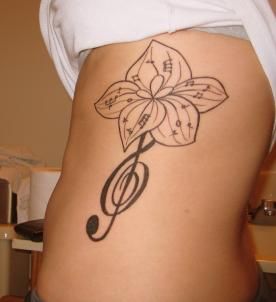 Flowers and music tattoo
