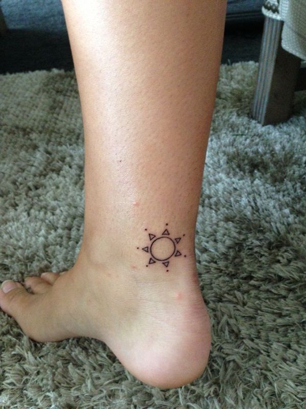 Leg sun tattoo