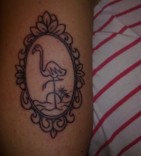 Mirror and flamingo tattoo