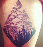 Mountains and tree tattoo
