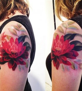 Red flowers tattoo by Amanda Wachob