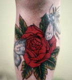 alice carrier tattoo big red flower under knee