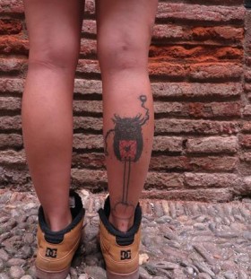 owl tattoo on back leg by matik