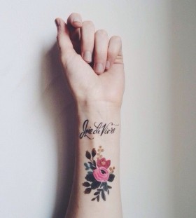 wrist tattoo flowers joie de vivre