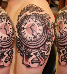 Gorgeous shoulder clock tattoo