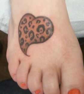 Lovely heart leopard tattoo