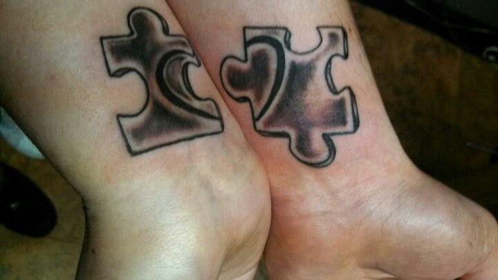 Lovely puzzle tattoo