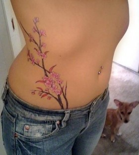 Pretty pink flowers hip tattoo