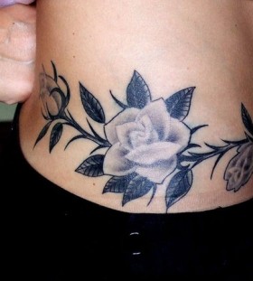 hip tattoo for girl dark rose