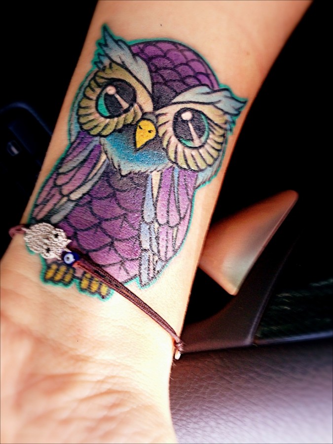 small purple tattoo owl