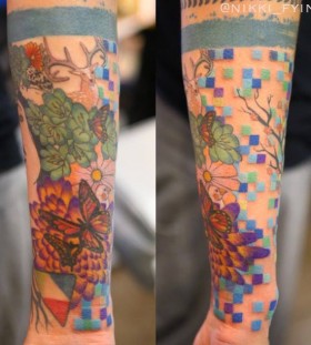Colorful tattoo by Nikki Ouimette