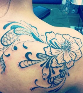 Flower tattoo by Nikki Ouimette