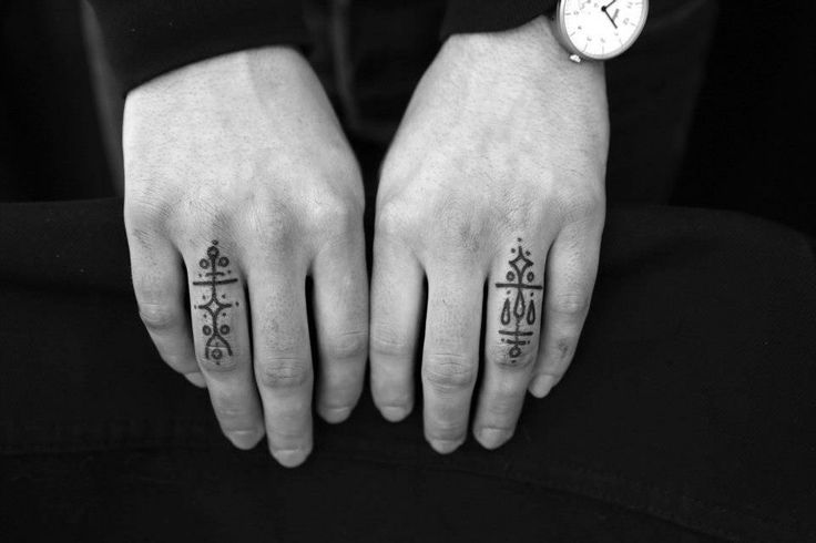 Hands fingers tattoo by Jean Philippe Burton