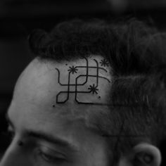 Head tattoo by Jean Philippe Burton