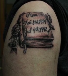 Impressive tattoo with red book