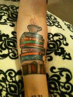 Nice tattoo with books and cup