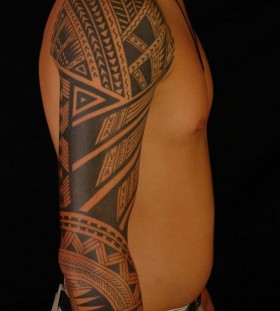 Polynesian tribal sleeve tattoo