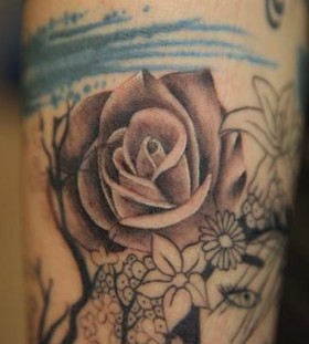 Rose tattoo by Nikki Ouimette