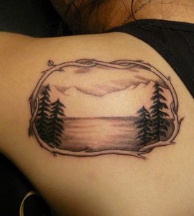 See and mountains tattoo