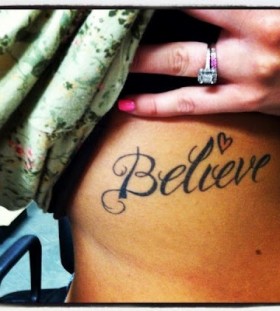 Woman body believe tattoo