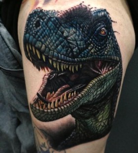 Angry dinosaur tattoo