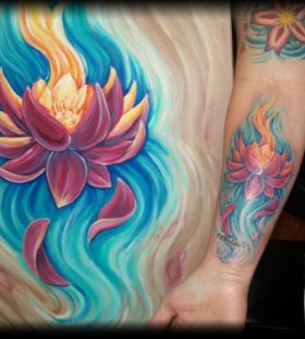 Colorful blue and yellow lotus flower tattoo