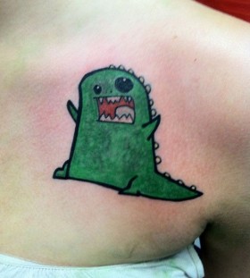 Funny green dinosaur tattoo
