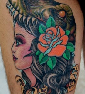Girl red rose and dinosaur tattoo