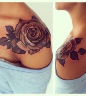 Adorable black rose tattoo on shoulder