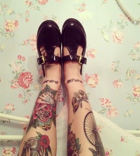 Adorable shoes and rose tattoo on leg