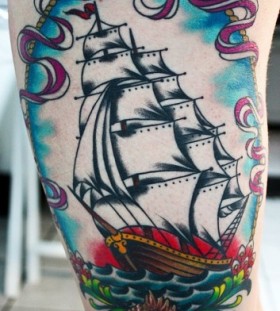 Adorable white and blue ship tattoo on leg