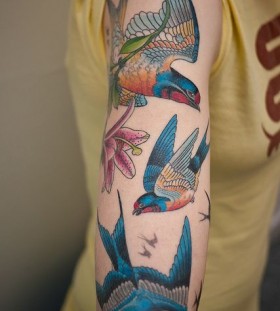 Amaizing hand blue bird tattoo